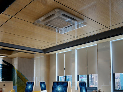 Deflector for four-way cassette air conditioners